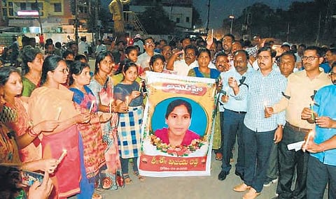 A file photo shows a candlelight procession by Revenue employees in Nizamabad, mourning the death of Abdhullapurmet Tahsildar Vijaya Reddy