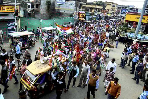 Trinamool Congress supporters participate in a protest rally against Citizenship Amendment Act at Bolpur in Birbhum Sunday Dec. 15 2019. (Photo | PTI)