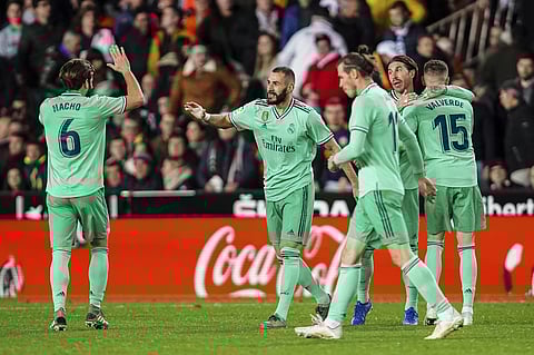 Karim Benzema celebrates his goal with teammates. (Photo | AP)