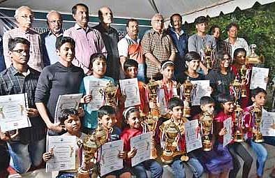 Winners of the inter-state aquatic meet with TNSAA and MDAA president Dr Sadayavel Kailasam (6th from left) in Chennai on Sunday |  p JAWAHAR