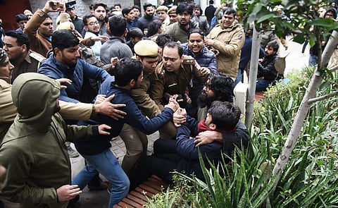 Members of AISA and ABVP fight during protest at Delhi University in New Delhi on Monday. (Photo | Parveen Negi, EPS)