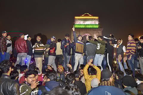 Students stage a demonstration at the India Gate in a show of solidarity with the students from Jamia Millia Islamia and several other universities across the country protesting the contentious amended citizenship law in New Delhi. (Photo | PTI)