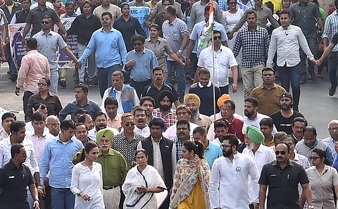 West Bengal Chief Minister Mamata Banerjee leads a rally vowing not to allow the proposed countrywide NRC and the Amended Citizenship Act in West Bengal in Kolkata Tuesday Dec. 17 2019. (Photo | PTI)