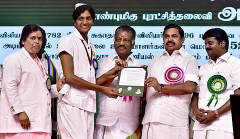 Chief Minister 'Edappadi' K Palaniswami hands over the appointment order to transgender woman Anbu Ruby
