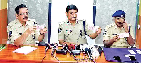 Visakhapatnam Police Commissioner RK Meena speaking to the media on fake racket gang busted in the in Visakhapatnam on Sunday| Express