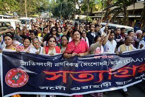 Activists of All Assam Students Union AASU along with members of different organizations during the 2nd day of their 'Satyagraha' protest demanding withdrawal of the Citizenship Amendment Act 2019 CAA in Guwahati Tuesday Dec. 17 2019. (Photo | PTI)