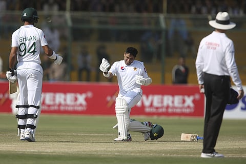 Pakistan's Abid Ali, center, celebrates his century against Sri Lanka. (Photo | AP)