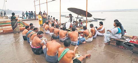 People perform rituals on the bank of the River Ganga in Varanasi | FILE