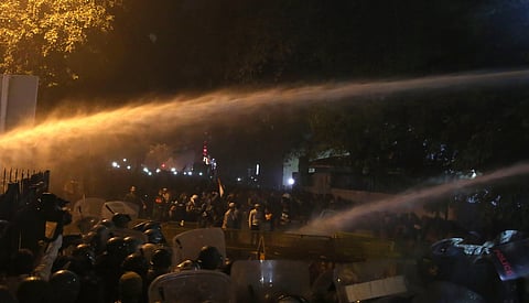 Delhi police use water canon during demonstration against Citizenship Amendment Act at Dariya Ganj in New Delhi on Friday. (Photo | Shekhar Yadav/EPS)