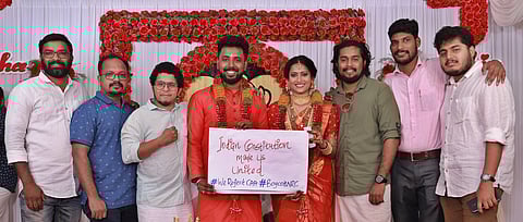 Sachin S L and Sneha N Murthy holding their placard against the Citizenship (Amendment) Act during their marriage. (Photo| EPS)