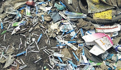 Used syringes found dumped in Vandalur, close to the Outer Ring Road, on Sunday. (Photo | EPS)
