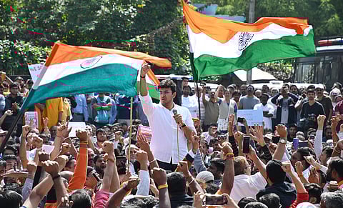Bangalore South MP Tejasvi Surya addresses the gathering at Town Hall,  Bengaluru, at a pro-CAA rally on Sunday. (Photo | EPS, Shriram BN)