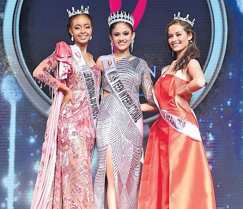 (Centre) Miss Teen International 2019 Aayushi Dholakia flanked by First and Second Runners-up after the event at Kingdom of Dreams, Gurugram