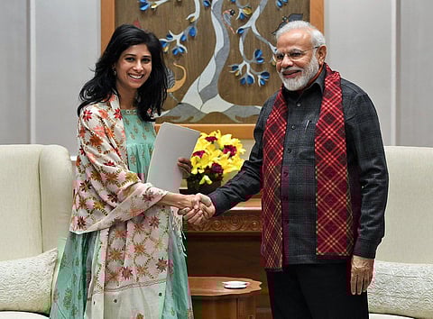 Economic Counsellor and Director of the Research Department at the International Monetary Fund (IMF), Gita Gopinath with PM Narendra Modi. (Photo | Twitter/@PMOIndia)
