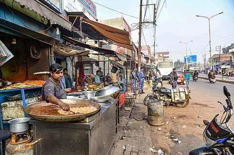 Police personnel stand guard a day after anti-CAA protests across the state in Lucknow Saturday Dec 21 2019. (Photo | PTI)