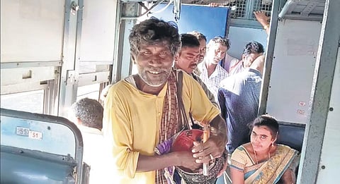 Bonela Asirayya singing janapada songs in a train in Srikakulam | express