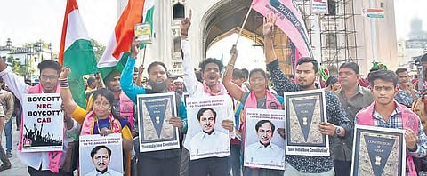 Members of TRS student wing protest against CAA and NRC at Charminar in Hyderabad on Monday