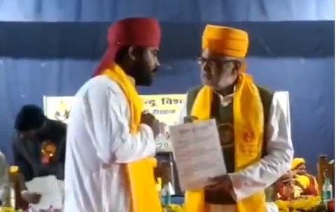 The BHU student on stage where he refused to accept his degree. (Photo| Screen grab)