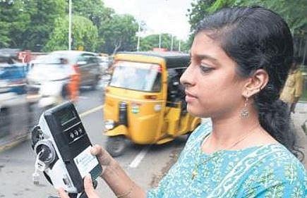 An IIT-M student measuring pollution levels near Raj Bhavan | R Satish Babu
