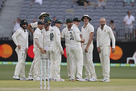 Australian players wait for a DRS review. (Photo | AP)