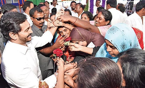 Women tie rakhi to Chief Minister YS Jagan Mohan Reddy’s hand at Rayachoti in Kadapa district on Tuesday I Express