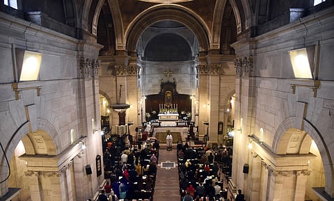 People offering early morning prayers on the occasion of Christmas celebrations at The Church of Cathedral Church of Redemption in New Delhi on Wednesday.  (Photo | EPS/Parveen Negi)