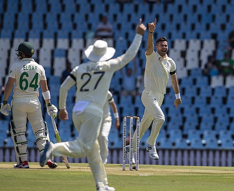 England's bowler James Anderson, right, celebrates with teammates after dismissing South Africa's Dean Elgar, far left, for a duck. (Photo | AP)