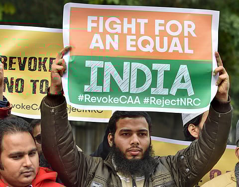 Activists hold placards during  anti-Citizenship Act protest (File Photo| PTI)