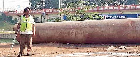 Swachhagrahi stands guard at Canal Road in Vijayawada on Saturday. (Photo | EPS)
