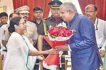 CM Mamata Banerjee and Governor Jagdeep Dhankar share frosty ties (Photo | PTI)