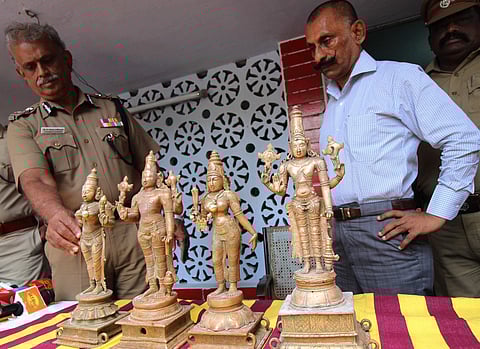 File image of Pon Manickavel and Shanmuga Rajeswaran IG south zone seen along with the recovered Panchaloha idols at Sozhavandhan police station in Madurai district. (File photo | EPS)