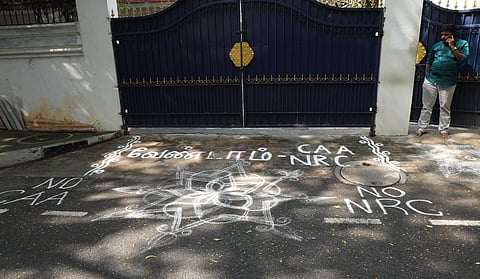 The kolam drawn by DMK partymen in protest aganist CAA and NRC at the entrance of DMK MP Kanimozhi's residence on monday morning. (Photo | Subramanian L/EPS)