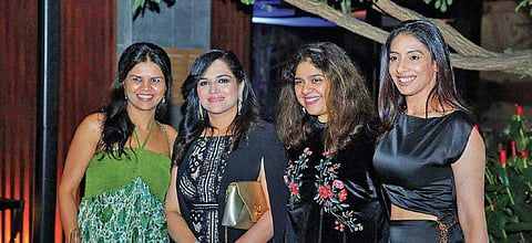 Wine lovers are all smiles at one of the wine-tasting sessions