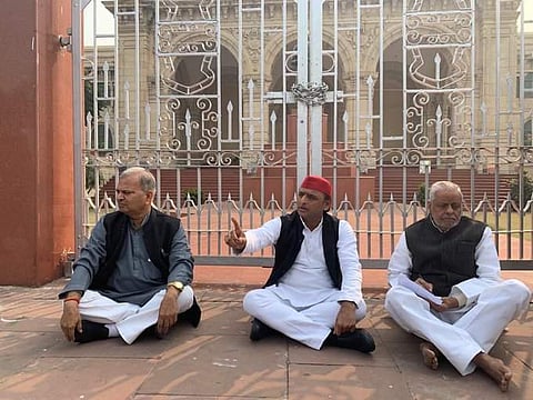 Akhilesh Yadav sat on a 'dharna' outside the Vidhan Bhavan, Lucknow. (Photo | ANI)
