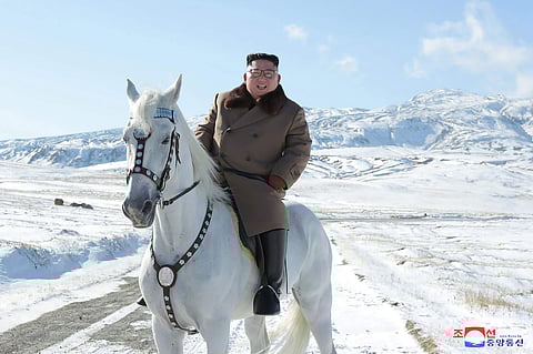 North Korean leader Kim Jong Un rides a white horse to climb Mount Paektu, North Korea. (Photo| AP)