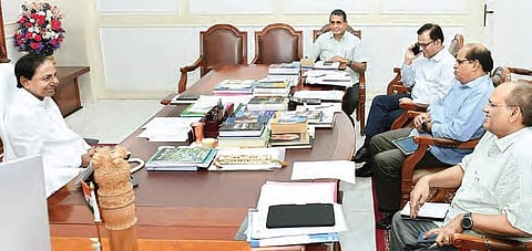 Chief Minister K Chandrasekhar Rao interacts with officials during a review of the financial situation of the state, in Hyderabad on Saturday  | Express