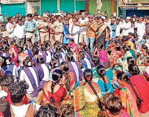 Students join a protest in Adilabad, seeking death for those who raped and killed a Dalit woman last month