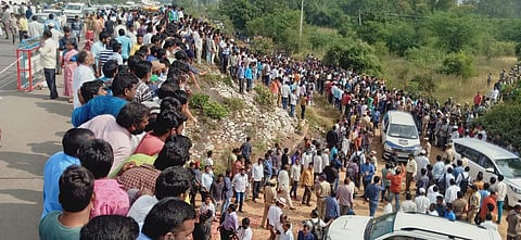 People gathered at the encounter spot on Friday morning (Photo | EPS)