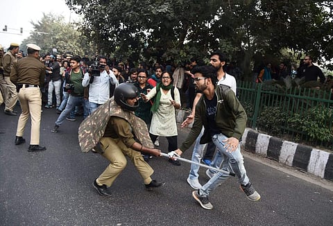 Police personnel lathi charge on JNU students during a protest against the fee hike issue, in New Delhi on Monday. (Photo | Parveen Negi/EPS)