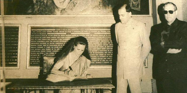 Then PM Rajiv Gandhi and his wife Sonia Gandhi visited the historic Cathedral. Photo taken on the occassion shows Sonia Gandhi giving her remarks in the visitors' book with Rajiv Gandhi looking on. (File Photo | PTI)