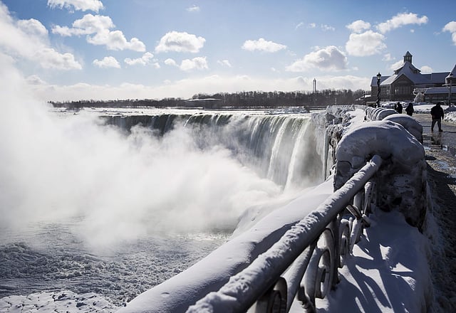 Michigan officials said efforts to conserve heat during the extreme cold reduced usage by 10 percent following a fire at a major natural gas facility. IN PIC: Ice and water flows over the brink of the Horseshoe Falls in Niagara Falls, Ontario, Canada. (Photo | AP)