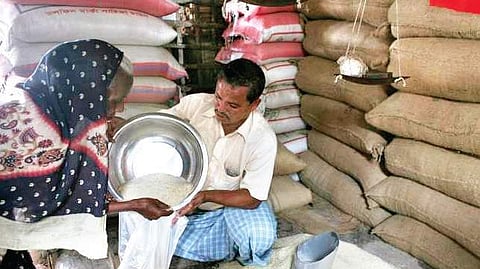 A ration card holder at a ration shop