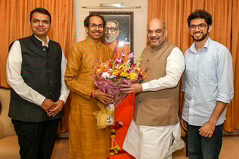 Devendra Fadnavis, Uddhav Thackeray, Amit Shah and Aditya Thackeray in happier times. Who will have the last laugh on June4? (File | PTI)