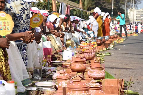 Devotees get ready to offer Pongala at Thampanoor in Thiruvananthapuram. (Photo | EPS/BP Deepu)