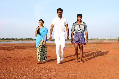 A still from the movie 'Pettikadai'