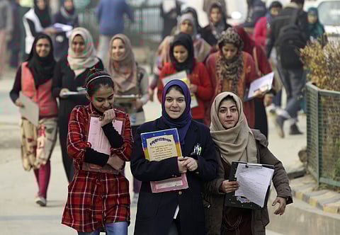 File photo of Kashmiri students leaving an examination center, in Srinagar (File Photo | AP)