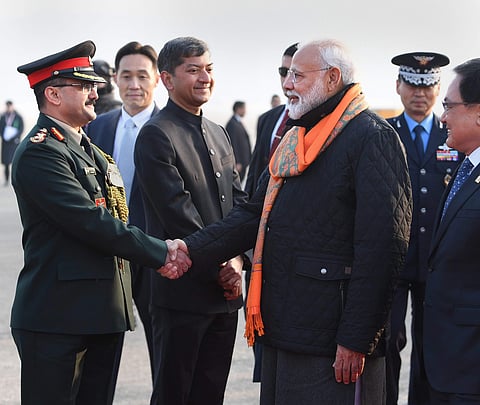Prime Minister Narendra Modi being welcomed upon his arrival at the airport in Seoul