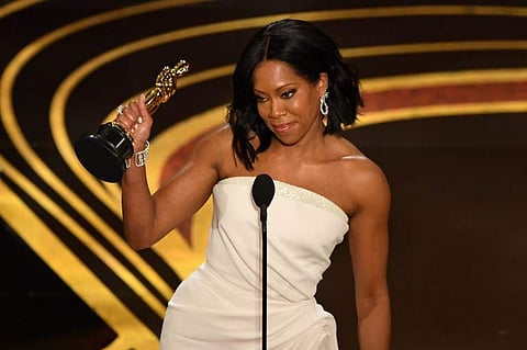 Best Supporting Actress nominee for 'If Beale Street Could Talk' Regina King accepts her Oscar during the 91st Annual Academy Awards at the Dolby Theatre in Hollywood, California. (Photo | AFP)