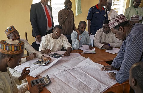 Electoral officials compile voting results at a collation center in Kano, northern Nigeria Sunday, Feb. 24, 2019. (Photo | AP)