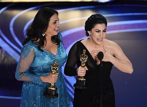 Melissa Berton, left, and Rayka Zehtabchi accept the award for best documentary short subject for 'Period. End of Sentence.' at the Oscars . (Photo | AP)